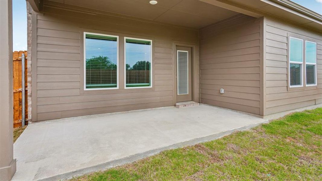 Exterior details and patio area of a home in Frontier Pointe, Princeton (Image 4).