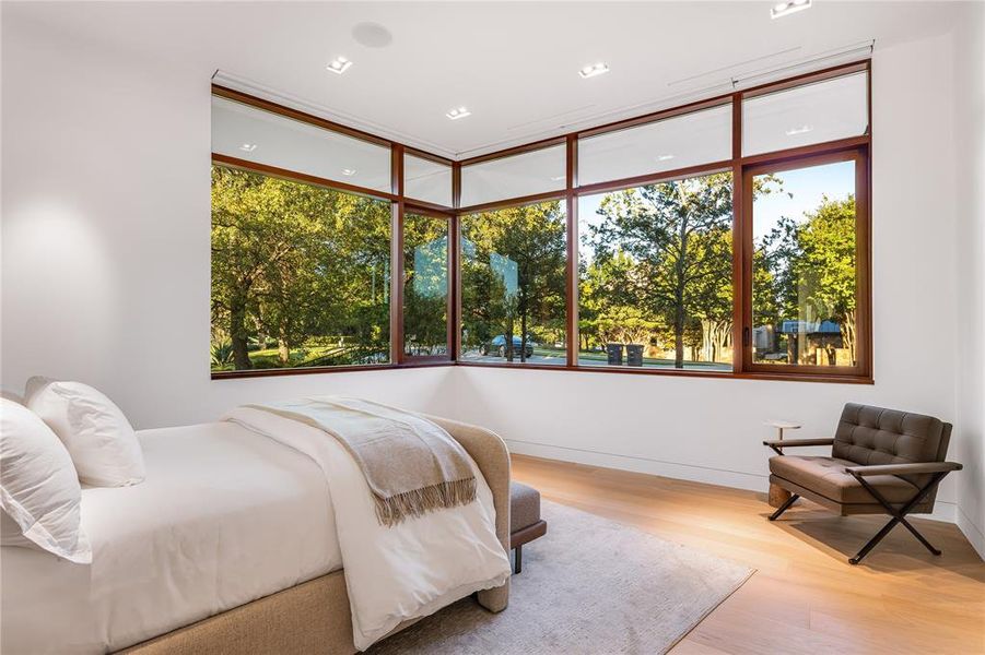 Guest bedroom with treehouse views.