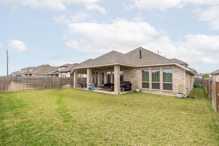 Exterior details and patio area of a home in Marvida, Cypress (Image 4).