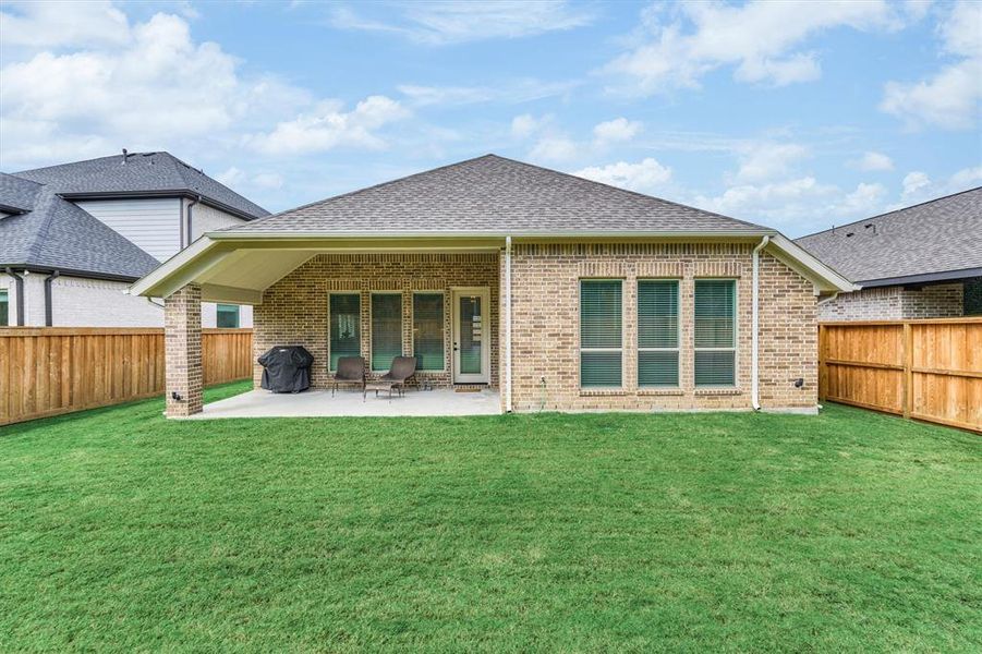 Backyard is a blank canvas for future improvements like a pool or outdoor playset.