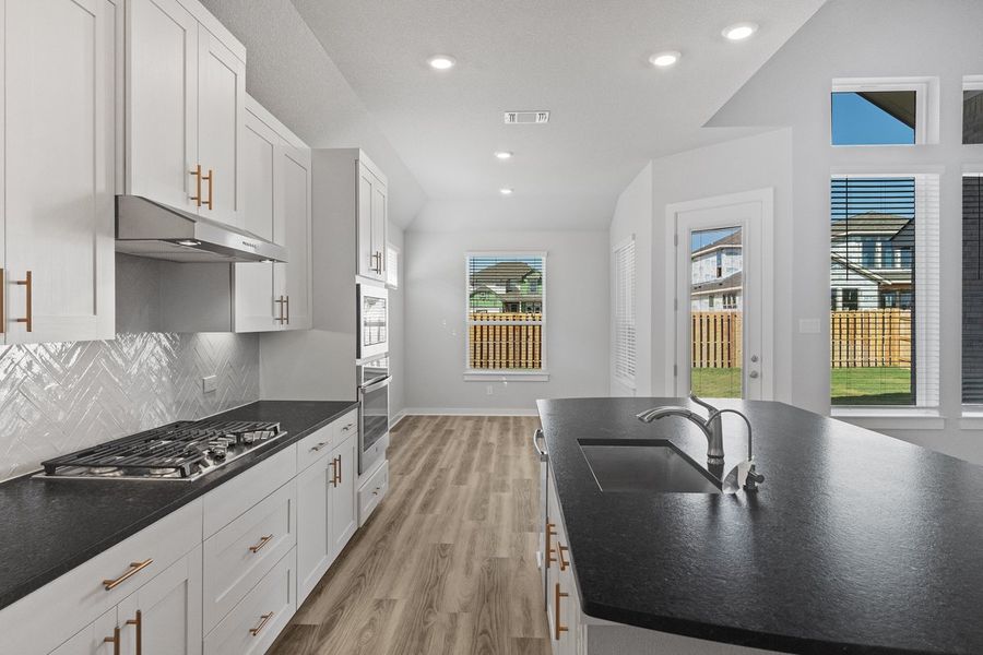 Furnished interior view inside a new home in The Grove at Blackhawk, Pflugerville (Image 10). Furnished interior view inside a new home in The Grove at Blackhawk, Pflugerville (Image 10).