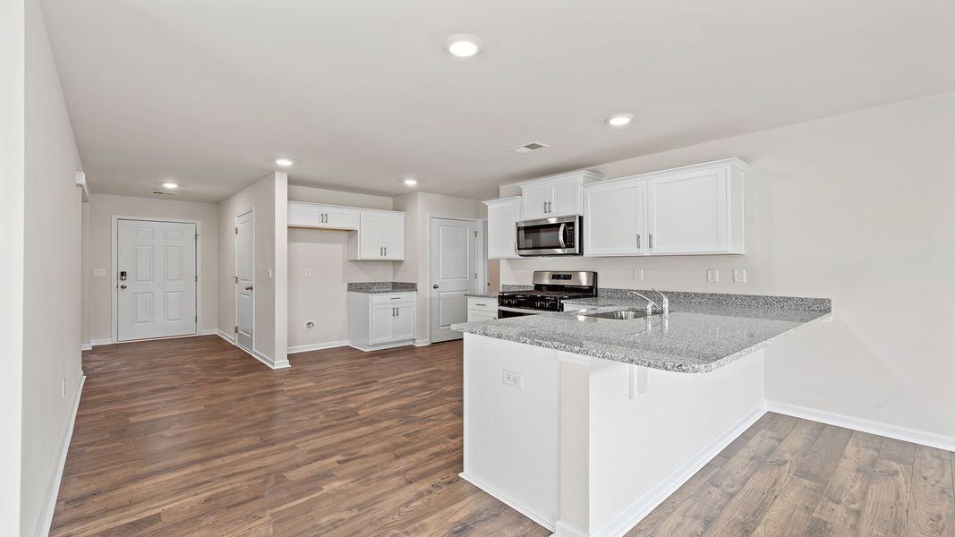 Representative furnished interior of a home built from the Macon by D.R. Horton in Bentley Park, Greenwood (Image 8).
