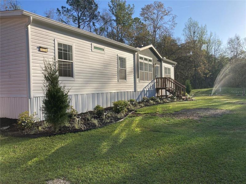 Exterior details and patio area of a home in , Micanopy (Image 3).