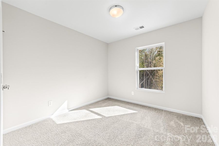 Spacious, unfurnished interior of a new home in , Bessemer City (Image 25).