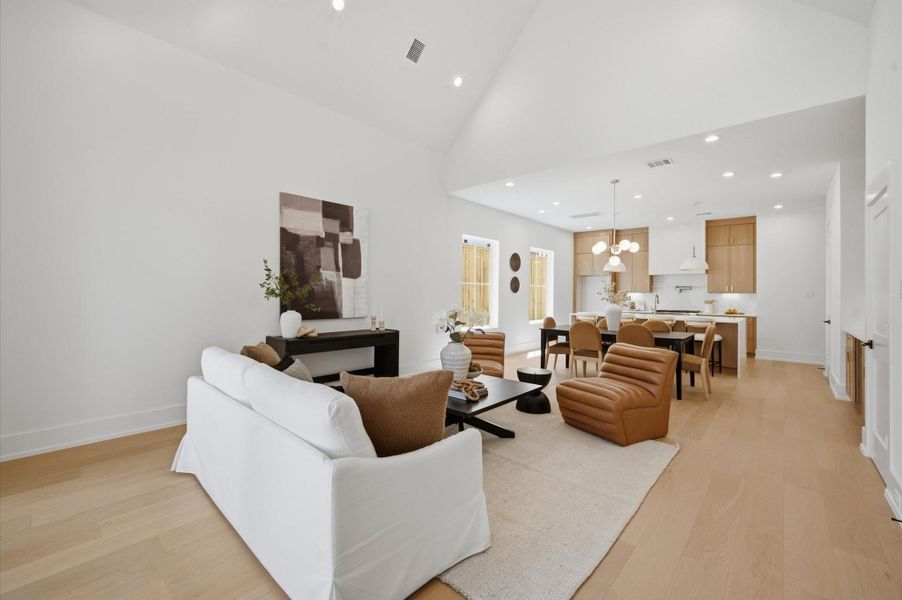 Spacious living and dining areas flow seamlessly into the kitchen.