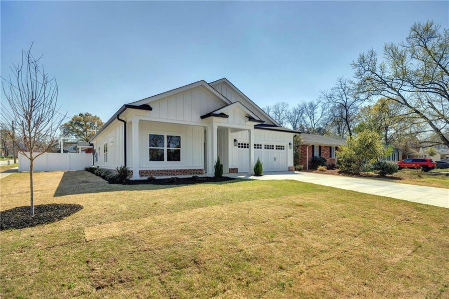 Front exterior of a new home in , Covington, GA, highlighting curb appeal (Image 25). Front exterior of a new home in , Covington, GA, highlighting curb appeal (Image 25).
