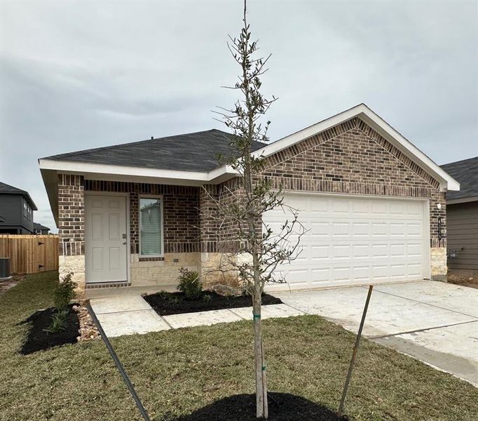 Lovely Curb Appeal with Landscape Package and Sprinkler System!