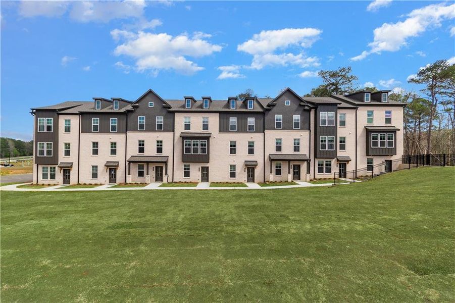 Front exterior of a new home in Daybreak, Newnan, GA, highlighting curb appeal (Image 24).