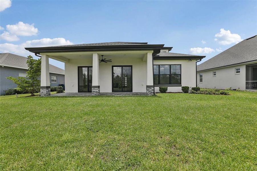 Exterior details and patio area of a home in , Auburndale (Image 29).