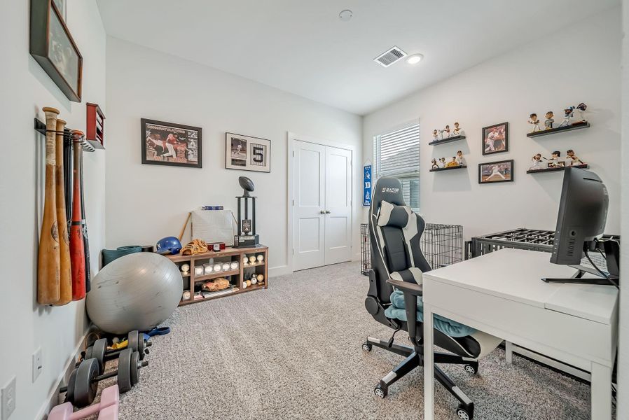 Furnished interior view inside a new home in The Groves, Humble (Image 27).