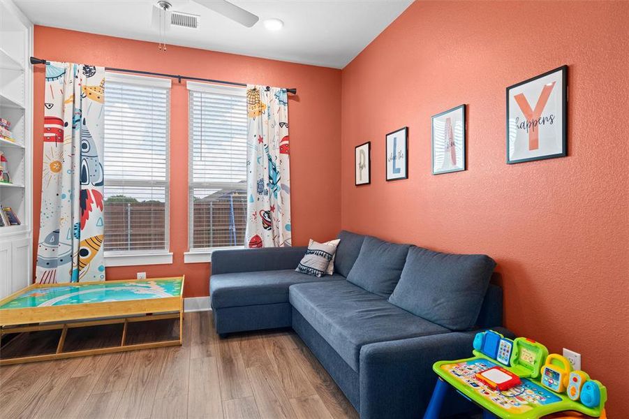 The "flex room" is currently used as a kid's play area, but could be used for a dining space, work out room and extra office!