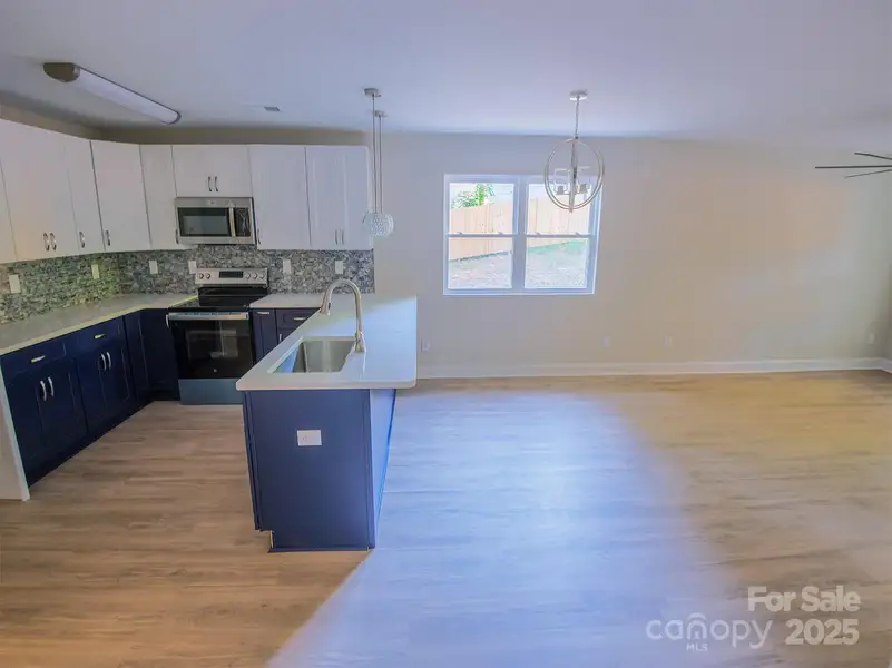 Furnished interior view inside a new home in , Gastonia (Image 1).