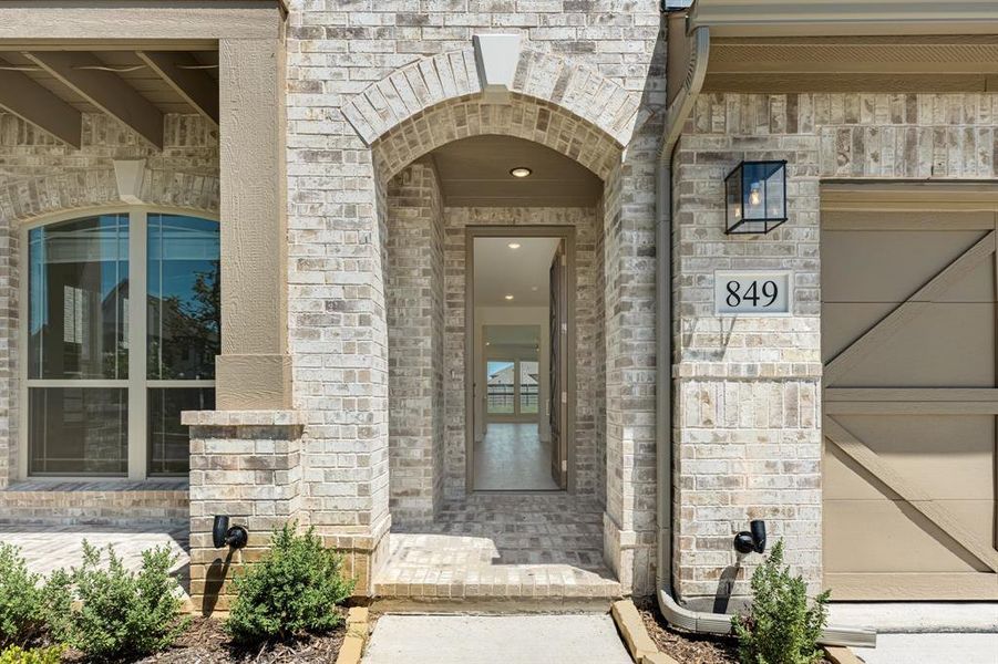 Front exterior of a new home in Union Park Classic 55, Little Elm, TX, highlighting curb appeal (Image 23).
