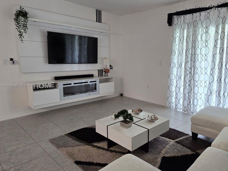 Furnished interior view inside a new home in Hammock Reserve, Haines City (Image 13).