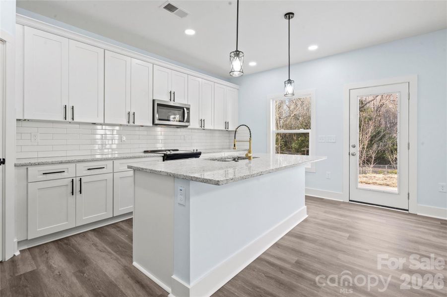 Furnished interior view inside a new home in , Concord (Image 6). Furnished interior view inside a new home in , Concord (Image 6).
