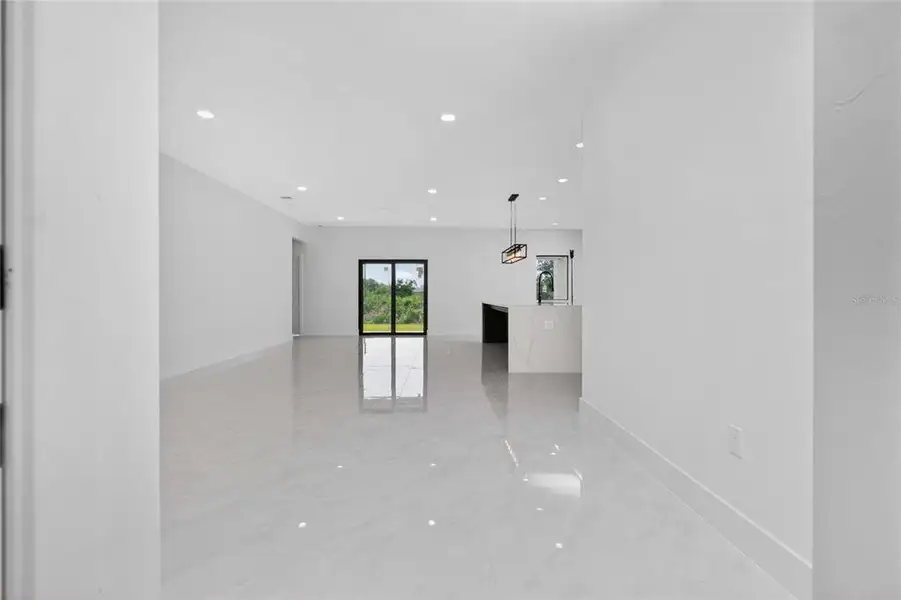 Spacious, unfurnished interior of a new home in , Port Charlotte (Image 21).