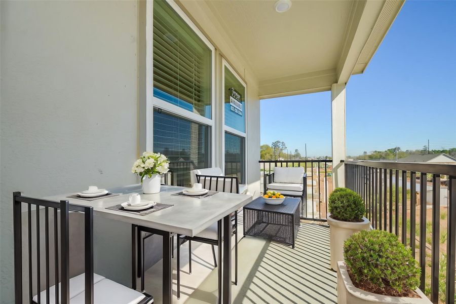 Step out onto this gorgeous and spacious balcony.
