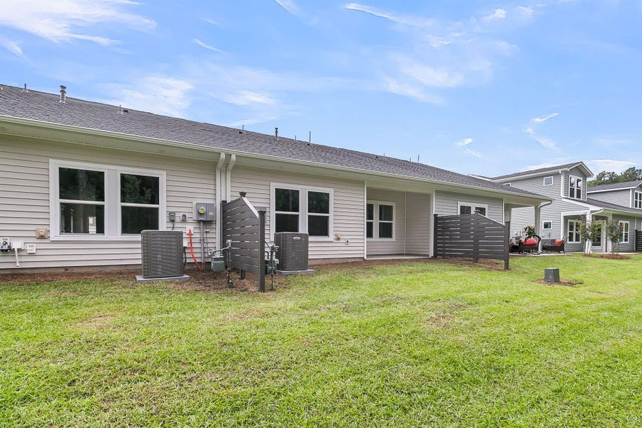 Front exterior of a new home in Hammock Walk at Nexton, Summerville, SC, highlighting curb appeal (Image 1). Front exterior of a new home in Hammock Walk at Nexton, Summerville, SC, highlighting curb appeal (Image 1).