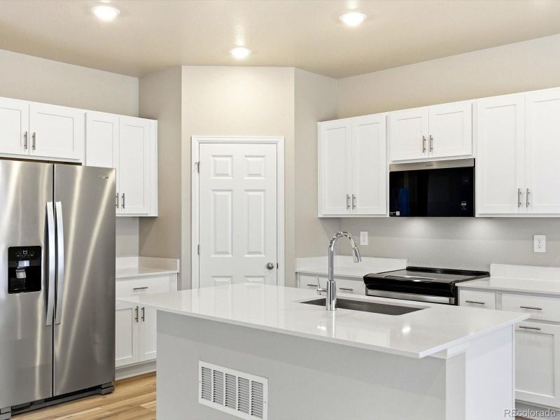 Furnished interior view inside a new home in , Thornton (Image 7).