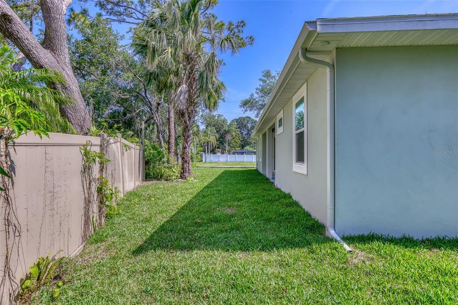 Exterior details and patio area of a home in , New Smyrna Beach (Image 30).