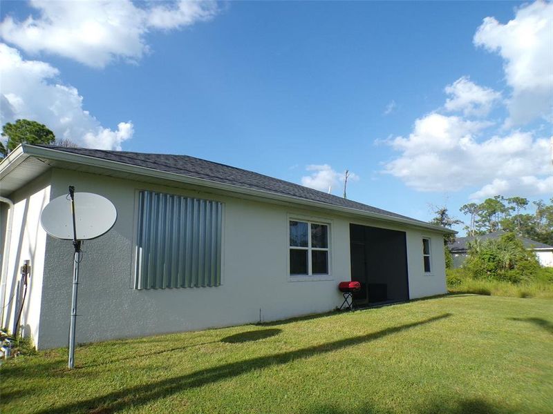 Exterior details and patio area of a home in , North Port (Image 3).