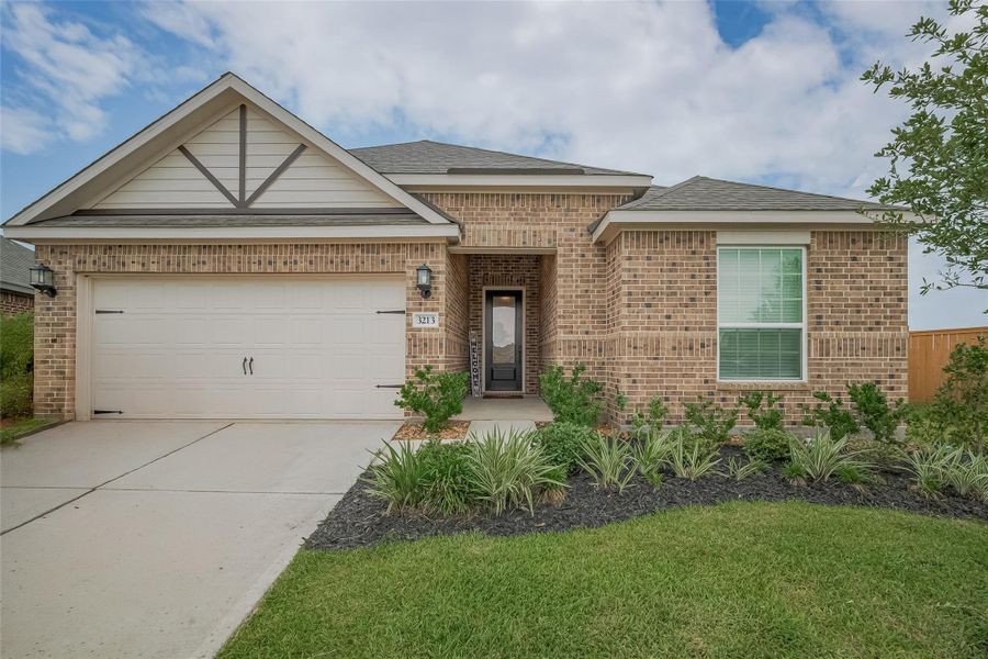 Front exterior of a new home in , Santa Fe, TX, highlighting curb appeal (Image 2). Front exterior of a new home in , Santa Fe, TX, highlighting curb appeal (Image 2).
