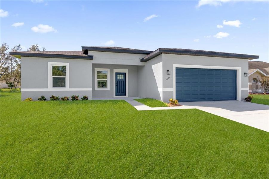 Front exterior of a new home in , Ocala, FL, highlighting curb appeal (Image 2). Front exterior of a new home in , Ocala, FL, highlighting curb appeal (Image 2).