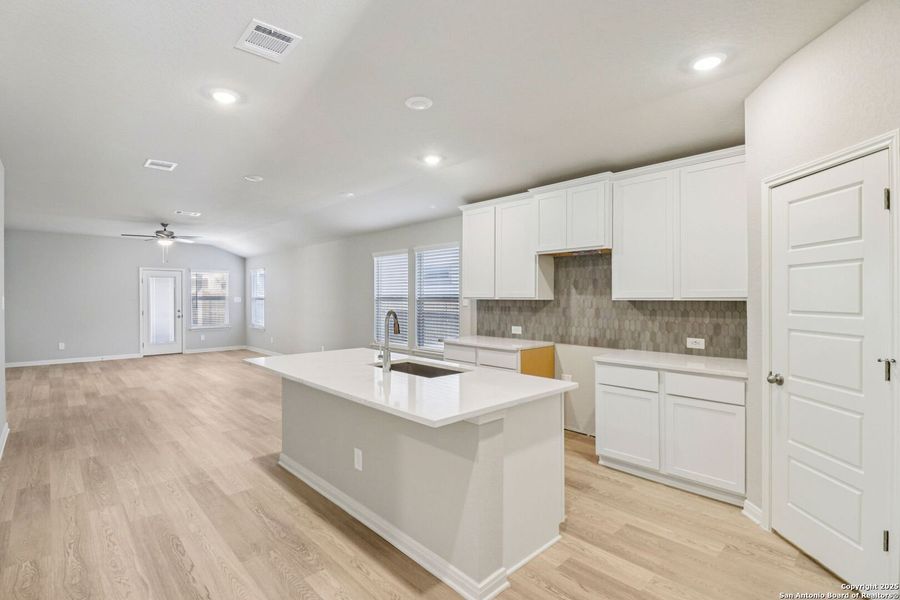 Furnished interior view inside a new home in Estancia Ranch - Premier Series, San Antonio (Image 12).