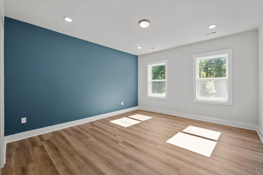 Representative unfurnished interior of a home built from the Bliss by Garman Homes in Golden Gate, High Point (Image 12).