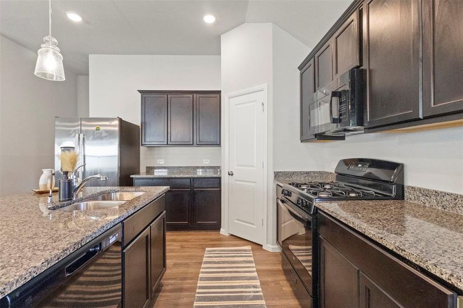 Furnished interior view inside a new home in Light Farms - Sweetwater, Celina (Image 12).