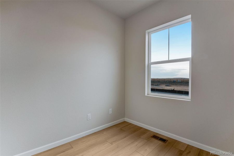 Spacious, unfurnished interior of a new home in Medley at Reunion Ridge, Commerce City (Image 32).