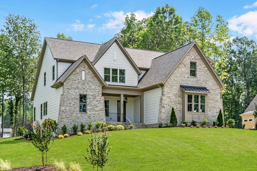 Front exterior of a new home in Cattail, Zebulon, NC, highlighting curb appeal (Image 2).