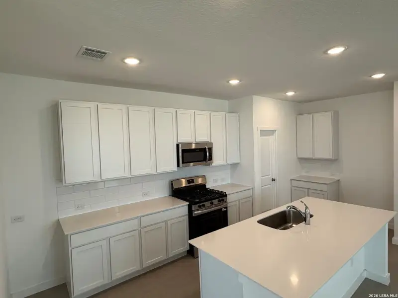 Furnished interior view inside a new home in Rose Valley, Converse (Image 6).