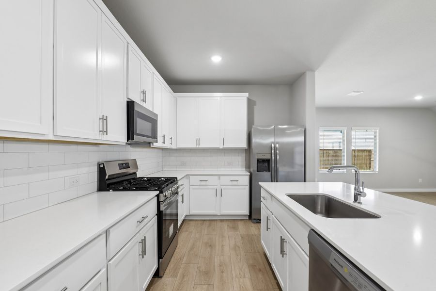 Kitchin in the Oscar home plan by Trophy Signature Homes
