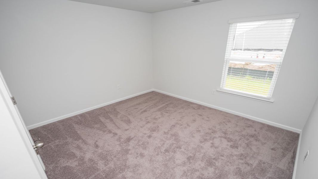 Representative unfurnished interior of a home built from the KERRY by D.R. Horton in Stanbury Creek, Supply (Image 16).