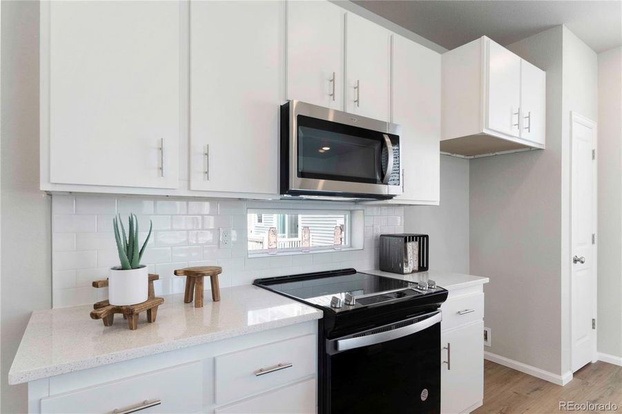 Furnished interior view inside a new home in , Commerce City (Image 29).