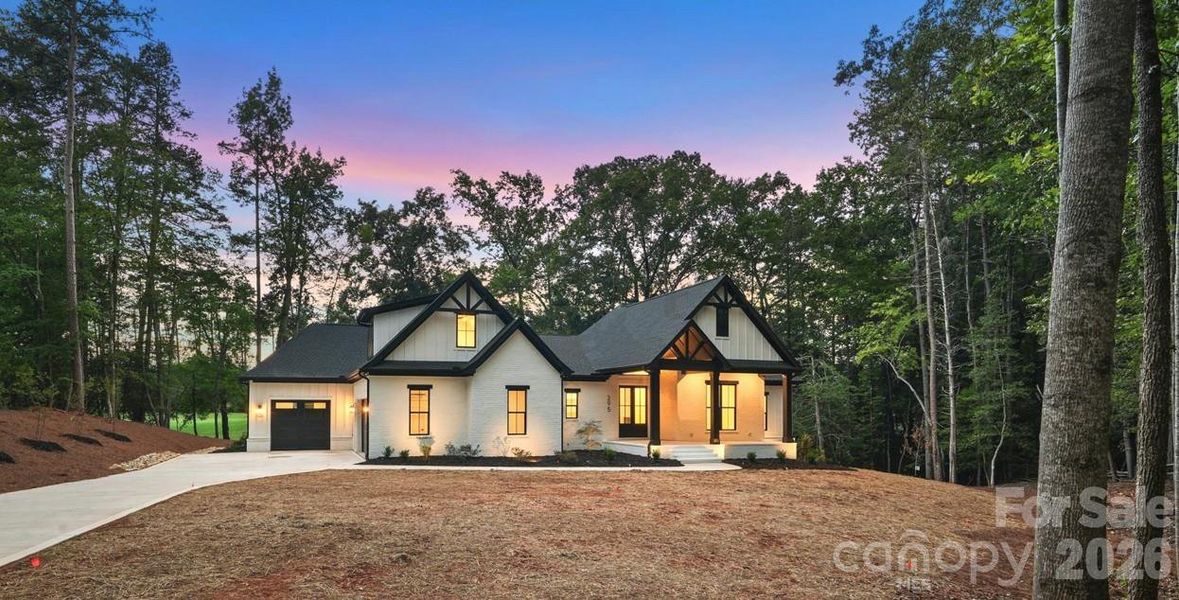 Front exterior of a new home in , Mount Gilead, NC, highlighting curb appeal (Image 28). Front exterior of a new home in , Mount Gilead, NC, highlighting curb appeal (Image 28).