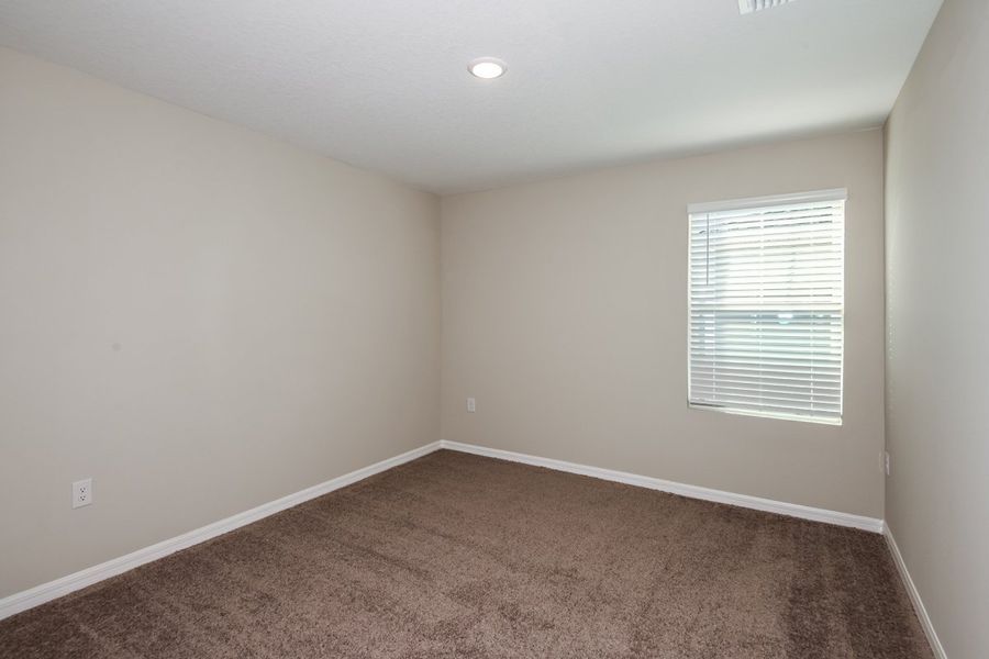 Spacious, unfurnished interior of a new home in Crosswinds, Haines City (Image 24).