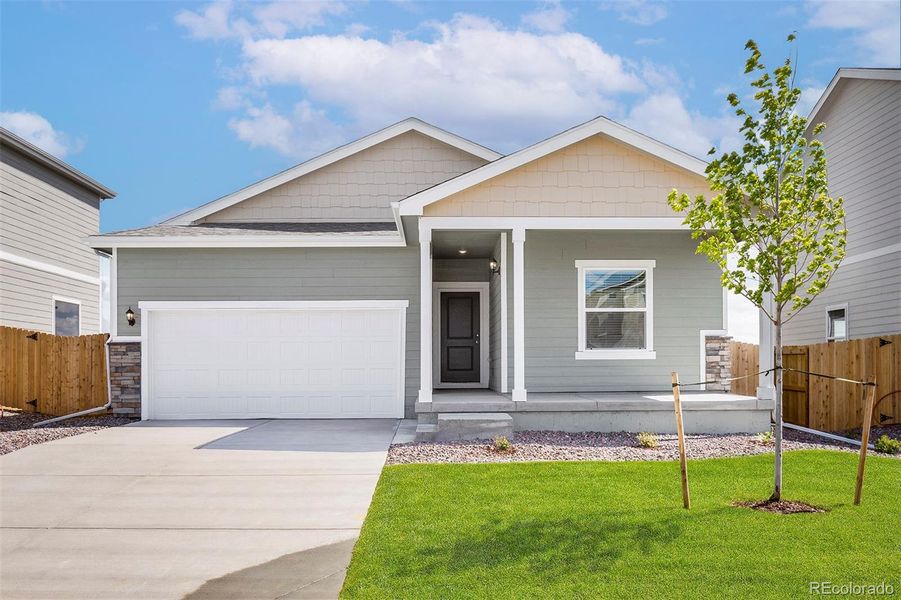 Front exterior of a new home in Bennett Ranch, Bennett, CO, highlighting curb appeal (Image 11).