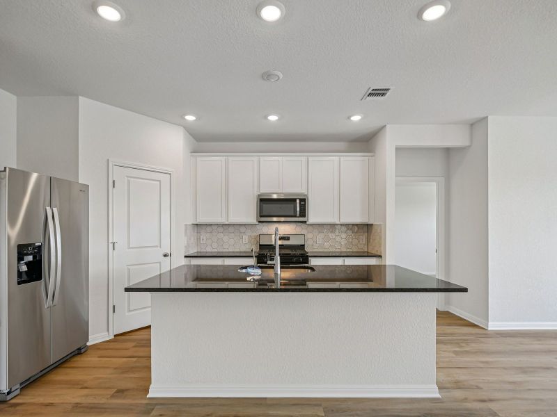 Furnished interior view inside a new home in Prairie Winds - Reserve Collection, Hutto (Image 3). Furnished interior view inside a new home in Prairie Winds - Reserve Collection, Hutto (Image 3).