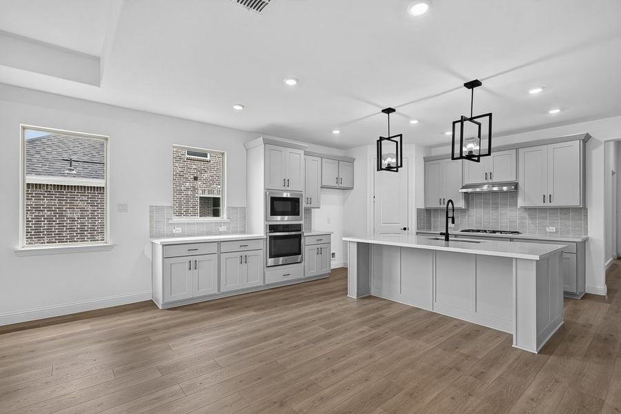Furnished interior view inside a new home in The Ranch at Uptown Celina, Celina (Image 7).