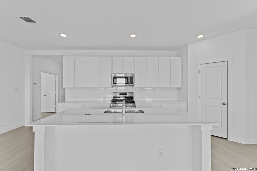 Furnished interior view inside a new home in Brookmill, San Antonio (Image 12).