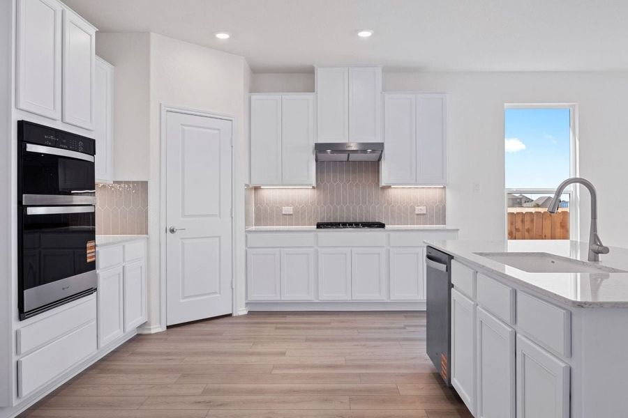 Furnished interior view inside a new home in Salerno - Classic Collection, Round Rock (Image 4).