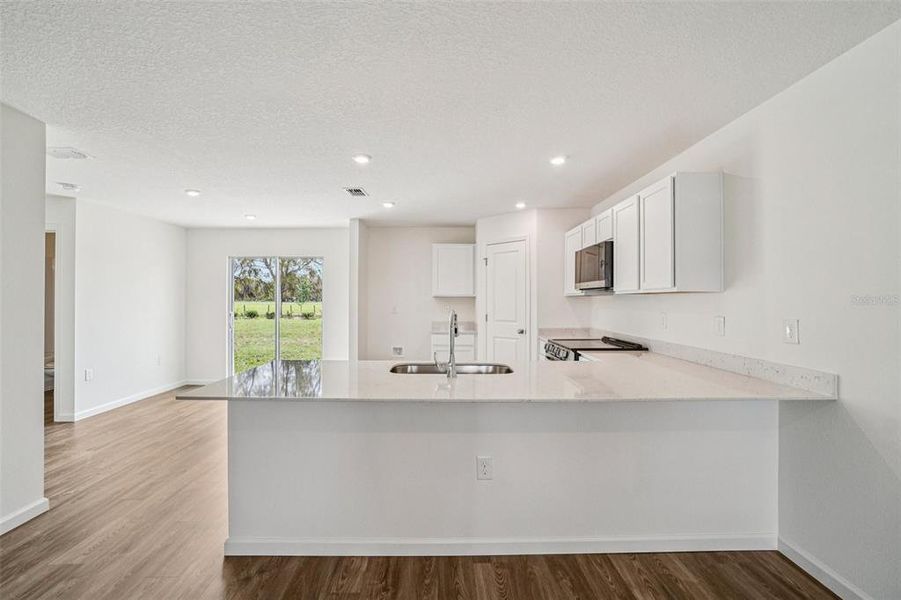Furnished interior view inside a new home in Sumter Villas, Sumterville (Image 9).