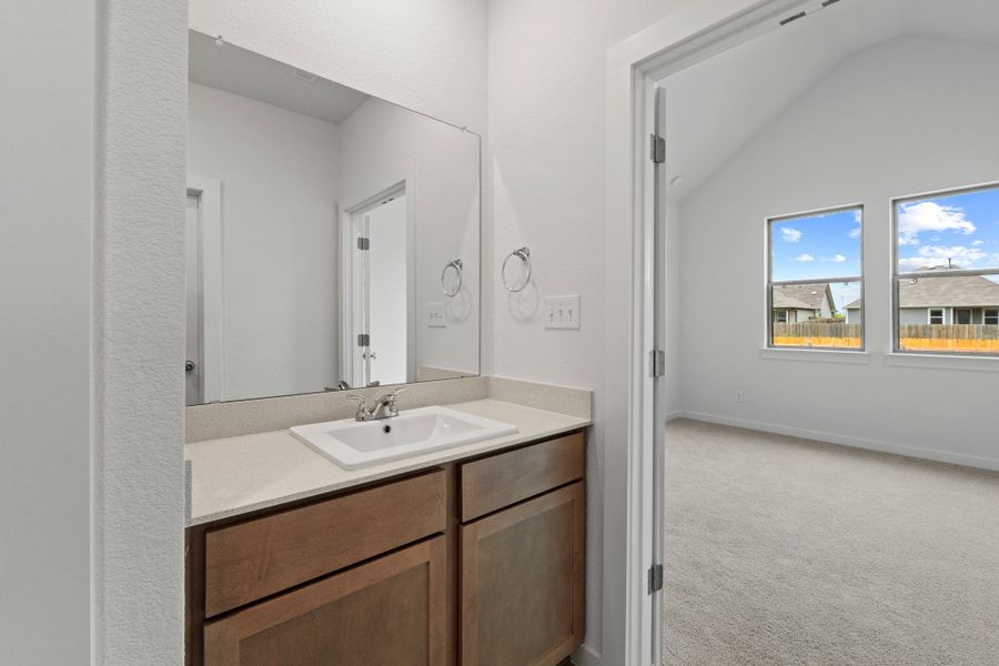 Primary Bathroom in the Pearl home plan by Trophy Signature Homes – REPRESENTATIVE PHOTO
