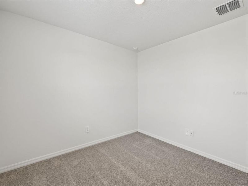 Spacious, unfurnished interior of a new home in The Reserve at Van Oaks, Auburndale (Image 13).