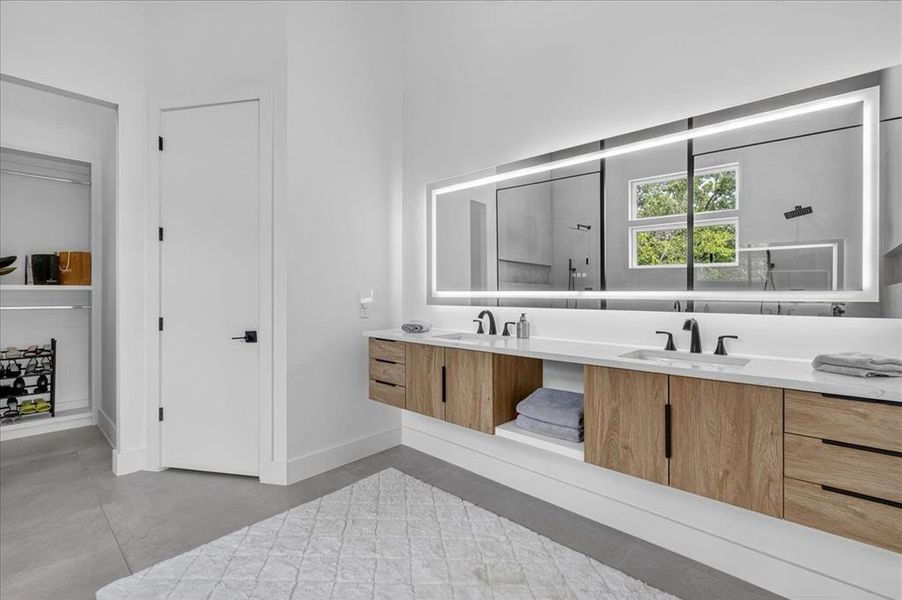 Primary bath designed with premium finishes throughout