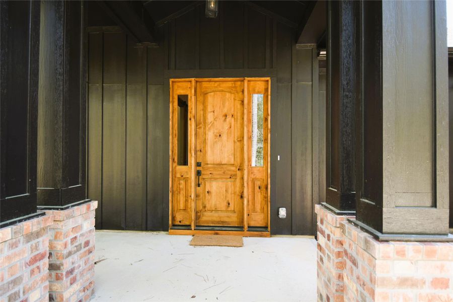Exterior details and patio area of a home in , Conroe (Image 24).