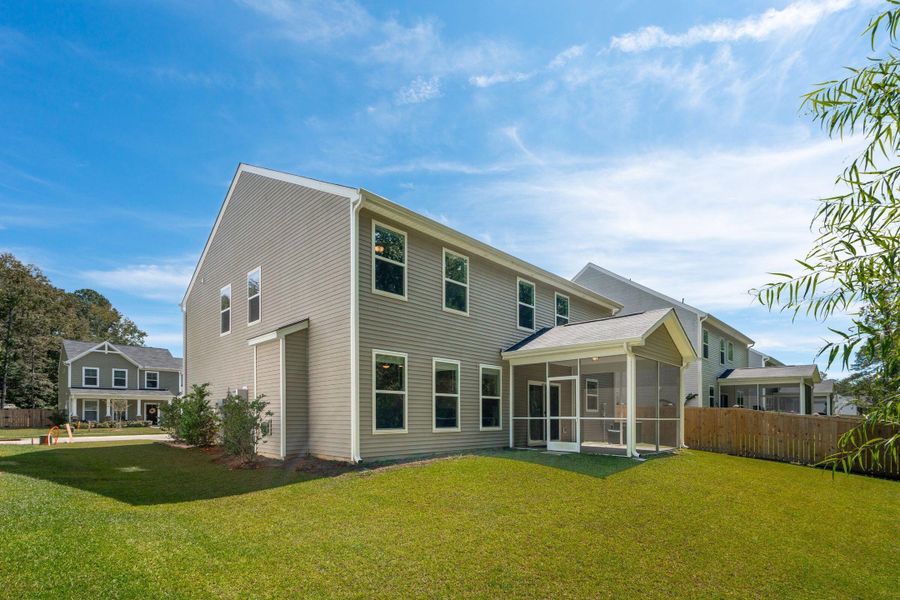 Front exterior of a new home in , Charleston, SC, highlighting curb appeal (Image 1).