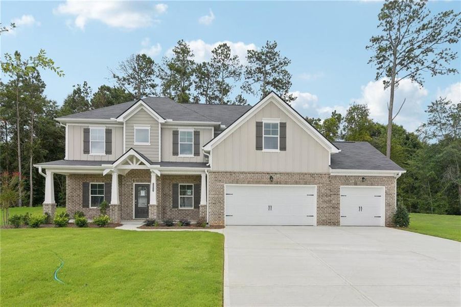 Front exterior of a new home in Stephen's Landing, Loganville, GA, highlighting curb appeal (Image 2).